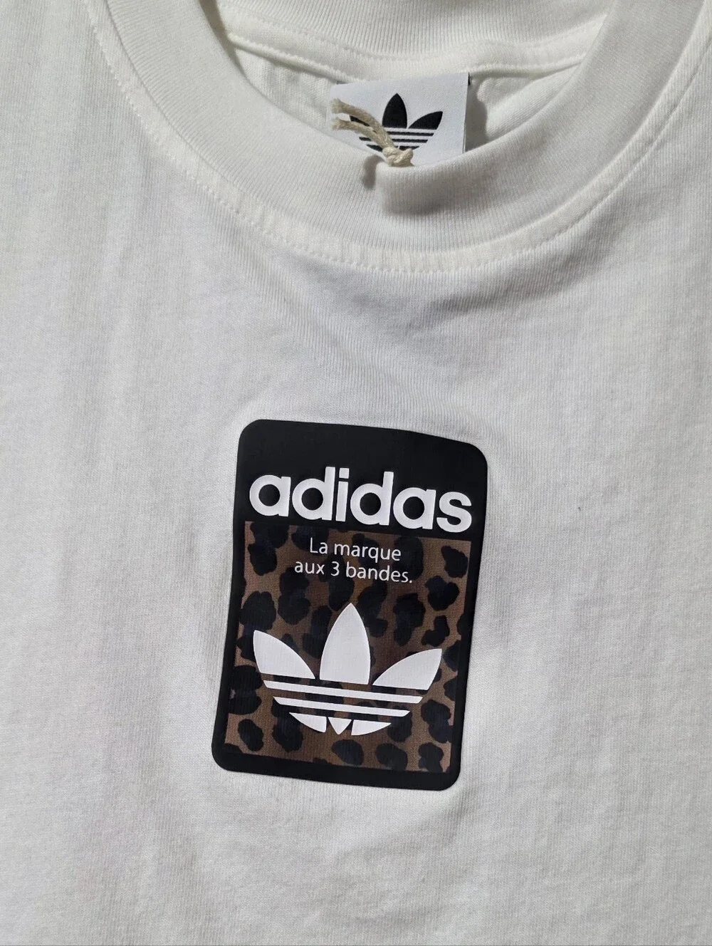 Adidas White Tee with Leopard Trefoil Patch Label